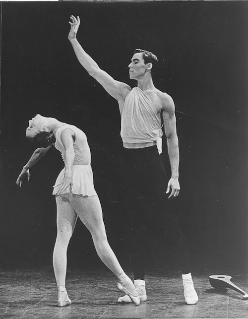 A young Jacque d'Amboise in Balanchine's Apollo with a fellow ballet dancer who wears a white leotard and skirt and is executing a back bend